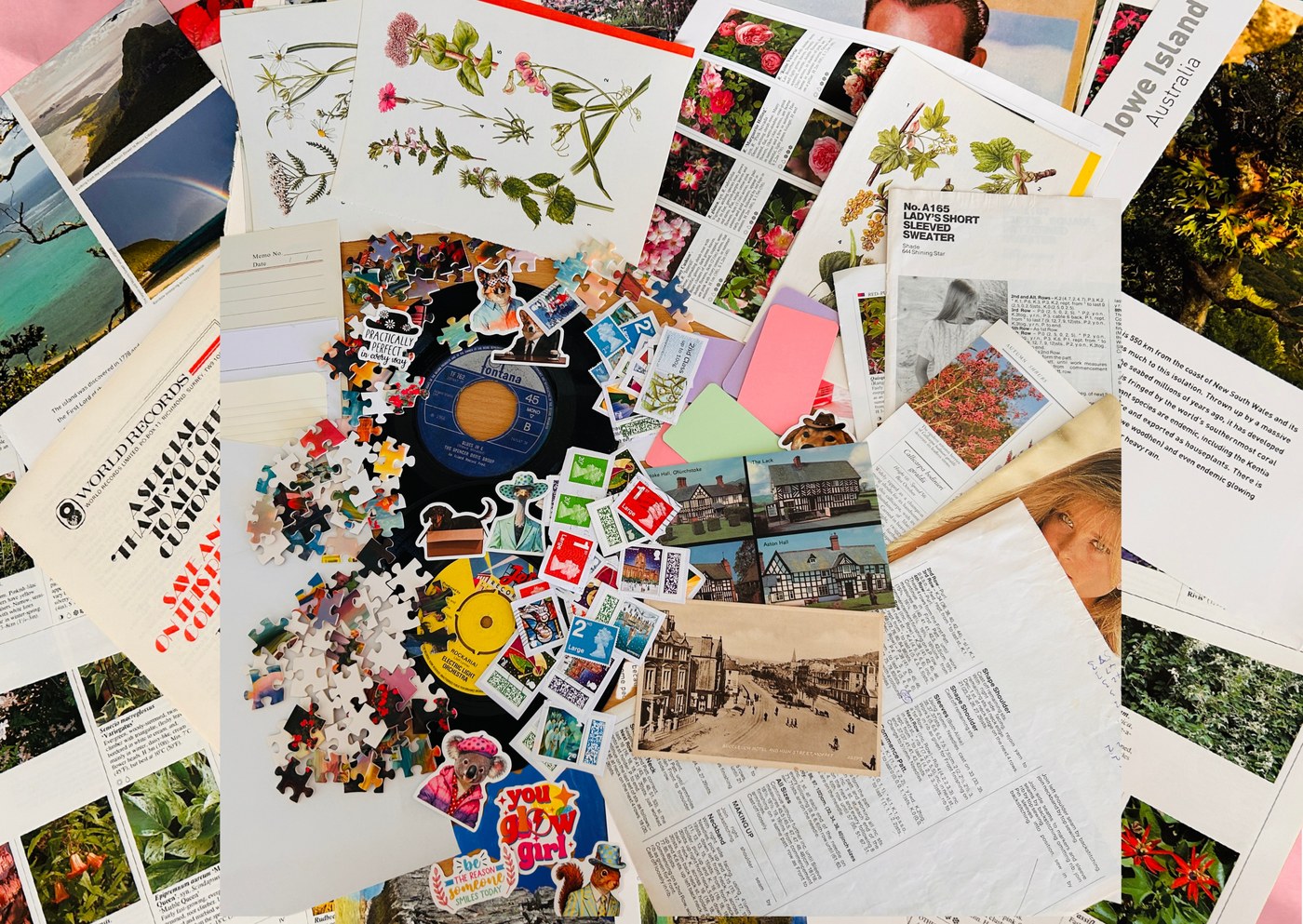 Starter Kit cover &mdash; a hand-packed mix of vintage papers, stamps, puzzle pieces, stickers and botanical prints